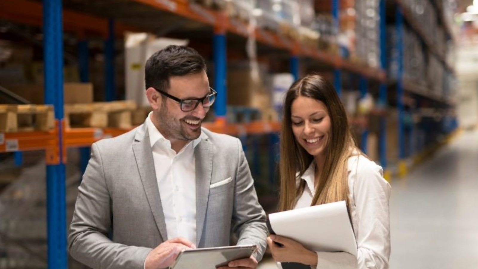 demo-attachment-868-managers-visiting-storage-center-discussing-about-distribution-goals-year